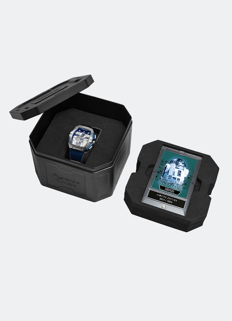 Jam tangan Alexandre Christie Star Wars R2-D2 edisi terbatas dengan dial perak biru dan tali karet polimer biru di dalam kotak kemasan khusus